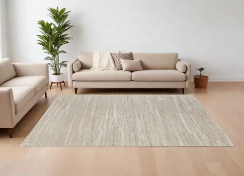 6' X 9' Ivory Abstract Hand Woven Worn Faded Area Rug