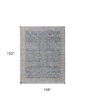 9' X 13' Taupe and Blue Ikat Power Loom Worn Faded Area Rug With Fringe