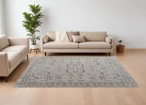 7' X 10' Gray Blue and Red Ikat Power Loom Worn Faded Area Rug With Fringe