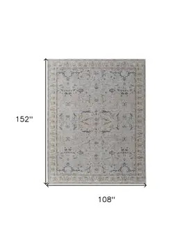 9' X 13' Gray Blue and Red Ikat Power Loom Worn Faded Area Rug With Fringe