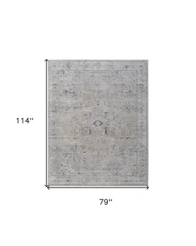 7' X 10' Ivory Taupe and Blue Oriental Power Loom Worn Faded Area Rug With Fringe
