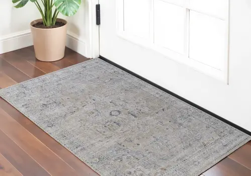 2' X 3' Ivory Taupe and Blue Oriental Power Loom Worn Faded Area Rug With Fringe