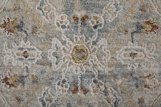 5' X 8' Ivory Tan and Blue Abstract Power Loom Worn Faded Area Rug With Fringe