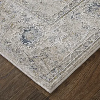 7' X 10' Ivory Taupe and Blue Floral Power Loom Worn Faded Area Rug With Fringe