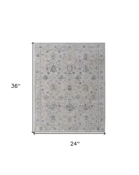2' X 3' Ivory Taupe and Blue Floral Power Loom Worn Faded Area Rug With Fringe