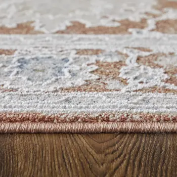 7' X 10' Red Blue and Ivory Floral Power Loom Worn Faded Area Rug With Fringe
