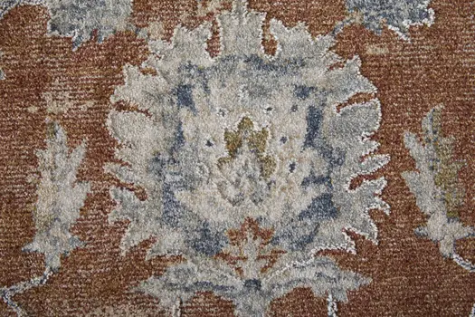 7' X 10' Red Blue and Ivory Floral Power Loom Worn Faded Area Rug With Fringe
