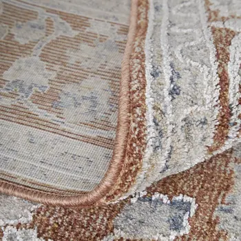 7' X 10' Red Blue and Ivory Floral Power Loom Worn Faded Area Rug With Fringe