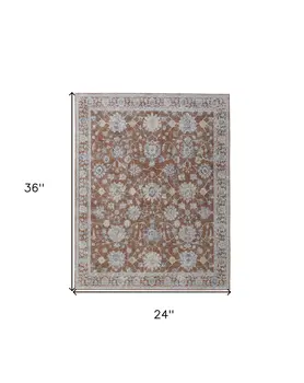 2' X 3' Red Blue and Ivory Floral Power Loom Worn Faded Area Rug With Fringe