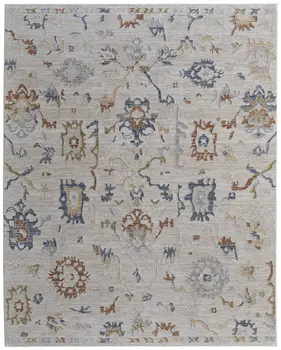 8' X 10' Ivory Blue and Gold Floral Power Loom Worn Faded Area Rug With Fringe