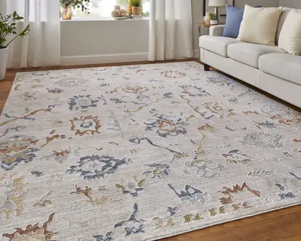2' X 3' Ivory Blue and Gold Floral Power Loom Worn Faded Area Rug With Fringe