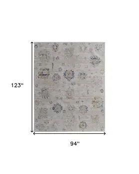 8' X 10' Ivory Taupe and Blue Floral Power Loom Worn Faded Area Rug With Fringe