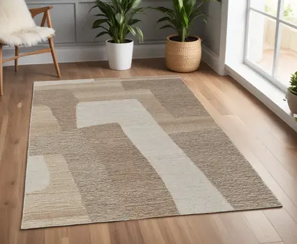 4' X 6' Brown Tan and Ivory Wool Abstract Hand Tufted Area Rug