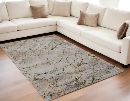 5' X 8' Taupe Green and Tan Abstract Power Loom Area Rug