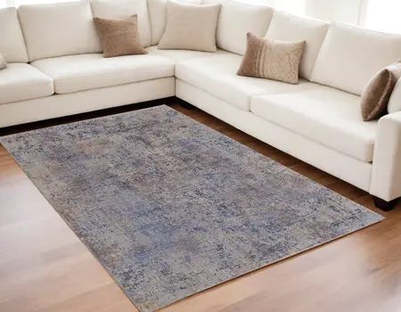 5' X 8' Blue Brown and Tan Abstract Power Loom Area Rug