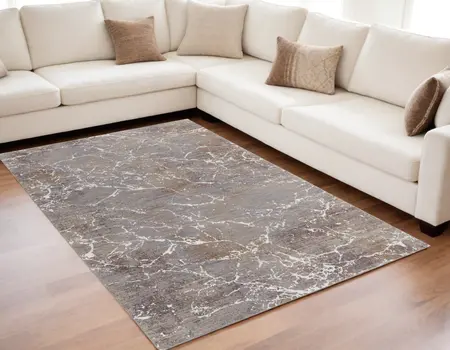 5' X 8' Ivory Brown and Taupe Abstract Power Loom Area Rug