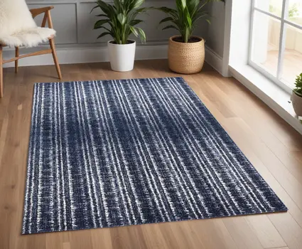 4' X 6' Blue Black and Ivory Power Loom Area Rug