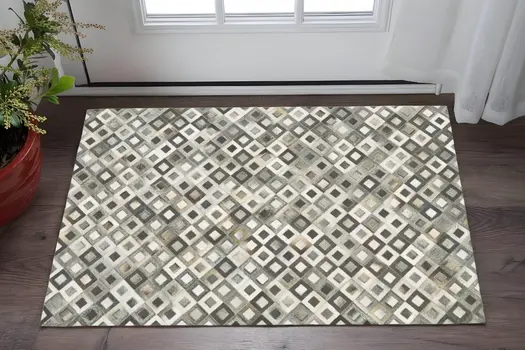 2' X 3' Black Gray and White Faux Cowhide Animal Print Power Loom Area Rug