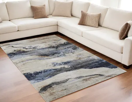 5' X 8' Blue Gray and Tan Abstract Power Loom Area Rug