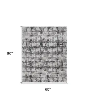 5' X 8' Gray and Ivory Abstract Power Loom Area Rug