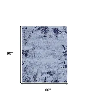 5' X 8' Light Blue and Black Abstract Power Loom Area Rug