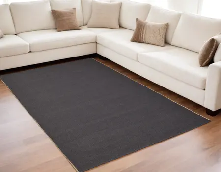 5' X 8' Tan and Gray Hand Woven Area Rug