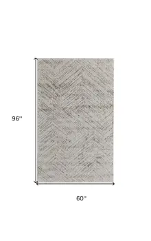 5' X 8' Ivory and Brown Geometric Power Loom Area Rug