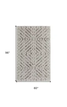 5' X 8' Ivory and Brown Geometric Power Loom Area Rug