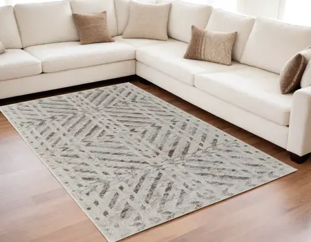 5' X 8' Ivory and Brown Geometric Power Loom Area Rug