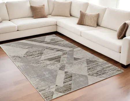 5' X 8' Ivory Gray and Brown Geometric Power Loom Area Rug