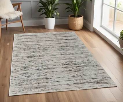 4' X 6' Ivory and Brown Geometric Power Loom Area Rug
