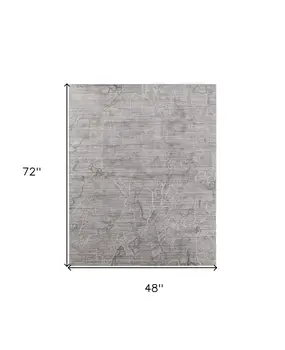 4' X 6' Gray and Ivory Abstract Hand Woven Worn Faded Area Rug