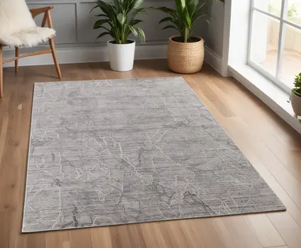 4' X 6' Gray and Ivory Abstract Hand Woven Worn Faded Area Rug