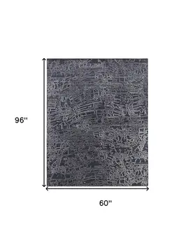 5' X 8' Black Gray and Ivory Abstract Hand Woven Area Rug