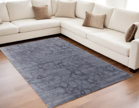 5' X 8' Gray and Blue Abstract Hand Woven Area Rug