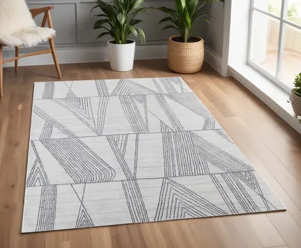 4' X 6' Black and Ivory Abstract Hand Woven Area Rug