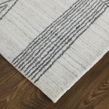 2' X 3' Black and Ivory Abstract Hand Woven Area Rug