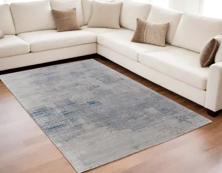 5' X 8' Gray Taupe and Blue Abstract Hand Tufted Area Rug