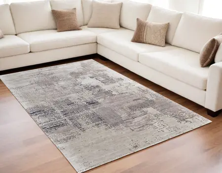 5' X 8' Brown Black and Tan Abstract Hand Tufted Area Rug