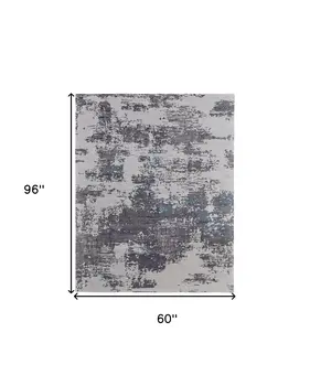 5' X 8' Ivory Brown and Blue Abstract Hand Tufted Area Rug