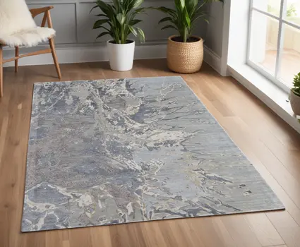4' X 6' Ivory Taupe and Green Abstract Hand Tufted Worn Faded Area Rug
