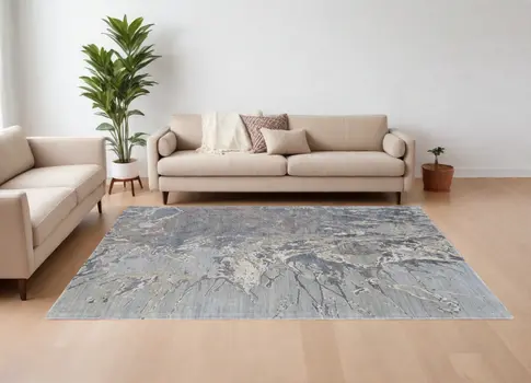 8' X 10' Ivory Taupe and Green Abstract Hand Tufted Worn Faded Area Rug