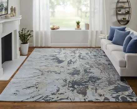 2' X 3' Ivory Taupe and Green Abstract Hand Tufted Worn Faded Area Rug