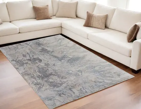 5' X 8' Gray Tan and Green Abstract Hand Tufted Worn Faded Area Rug