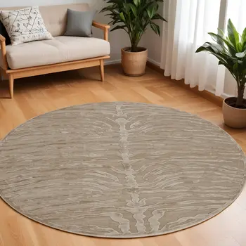 8' Tan and Ivory Animal Print Power Loom Round Rug