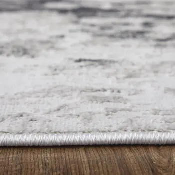 2' X 3' Ivory and Gray Abstract Power Loom Worn Faded Area Rug