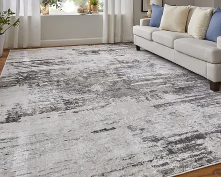 2' X 3' Ivory and Gray Abstract Power Loom Worn Faded Area Rug