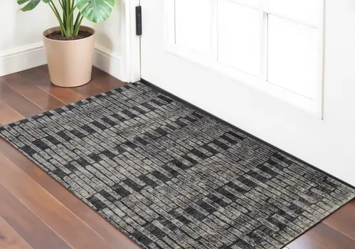 2' X 3' Gray Black and Ivory Geometric Power Loom Worn Faded Area Rug