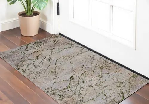 2' X 3' Taupe Green and Tan Abstract Power Loom Area Rug