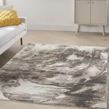 5' X 7' Tan Abstract Power Loom Area Rug